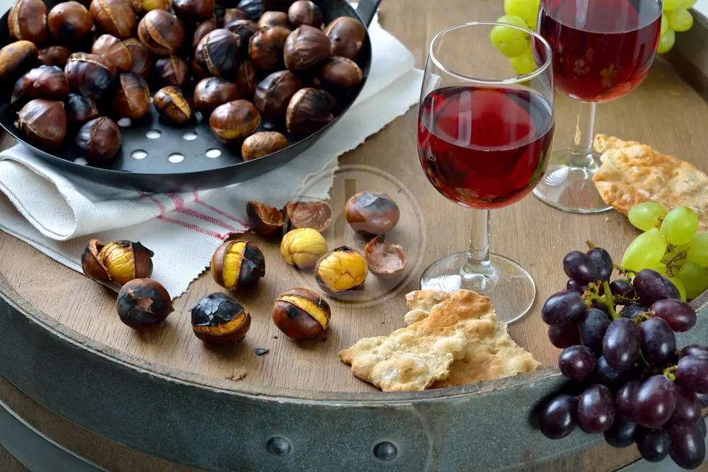 winetastinginsouthtyrolwithroastedchestnutsandthe.webp